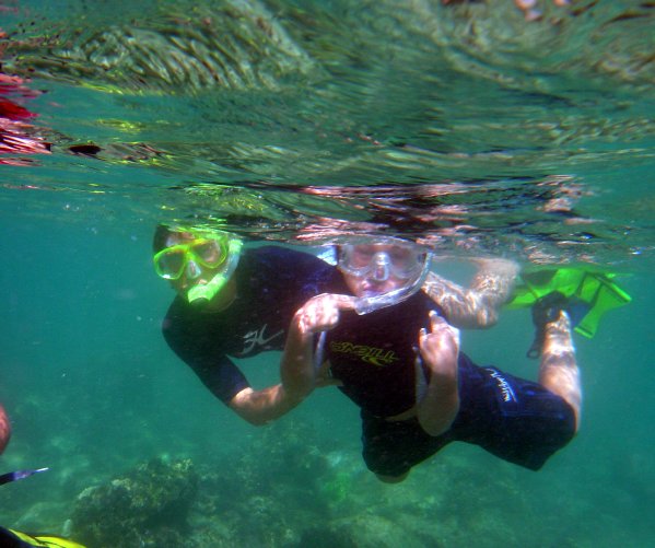 Mom & Matthew dancing under water